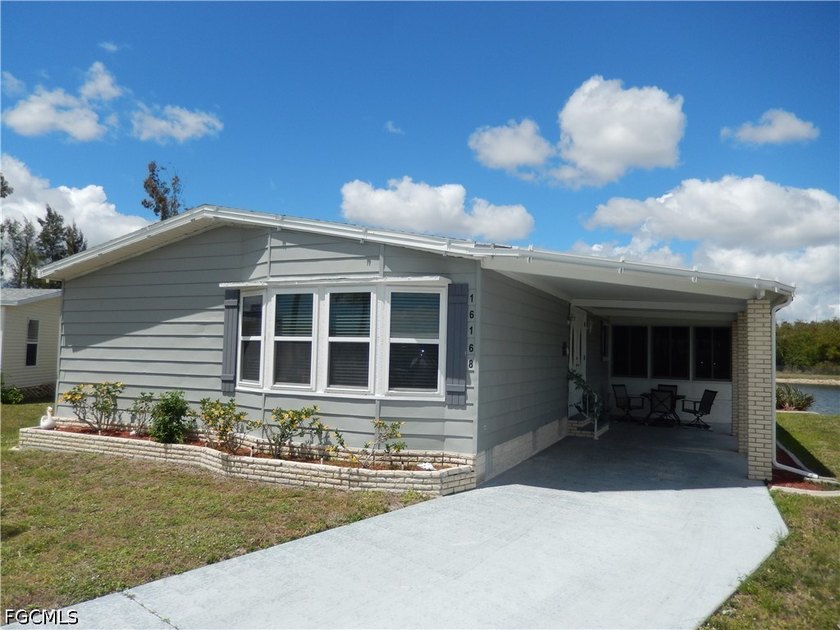 Sweeping PANORAMIC WATEFRONT VIEW! Let nature's BEAUTY welcome - Beach Home for sale in Fort Myers, Florida on Beachhouse.com