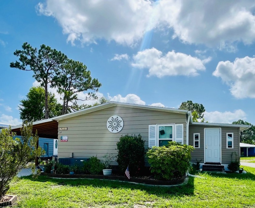 This well-maintained two-bedroom, two-bathroom residence offers - Beach Home for sale in North Fort Myers, Florida on Beachhouse.com