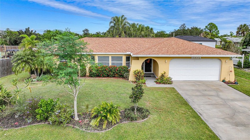 This inviting 2-bedroom + flex room, 2-bathroom, 2-car garage - Beach Home for sale in Port Charlotte, Florida on Beachhouse.com
