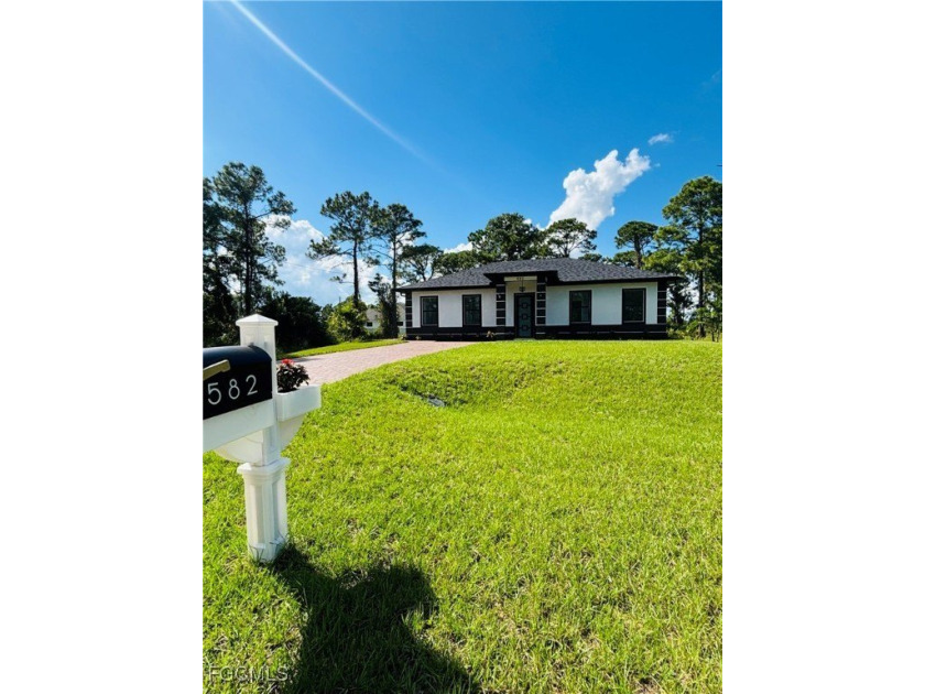 Welcome to this Stunning 4 bedroom and 3 bathroom modern home - Beach Home for sale in Lehigh Acres, Florida on Beachhouse.com
