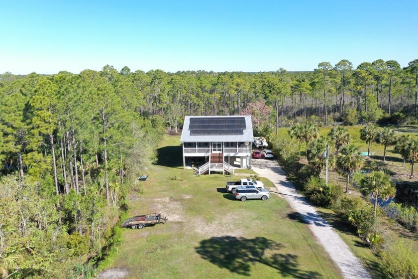 Exquisite 3-bedroom, 2-bathroom residence with elevator nestled - Beach Home for sale in Port St Joe, Florida on Beachhouse.com