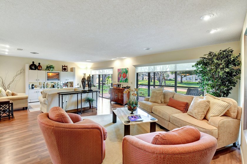 Located in the highly desirable Hunters Run Country Club, this - Beach Condo for sale in Boynton Beach, Florida on Beachhouse.com