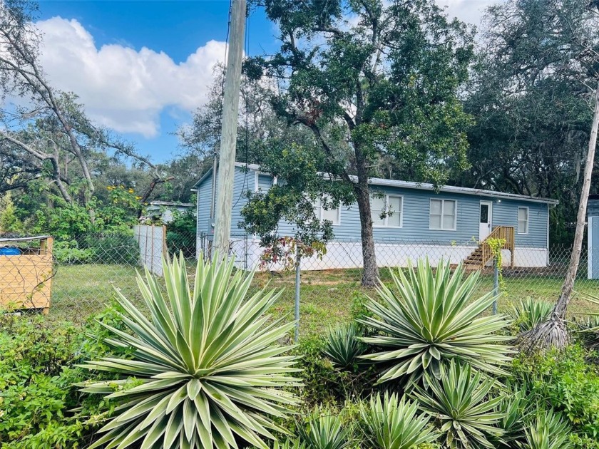 3/2 manufactured home located in Moon Lake. New vinyl flooring - Beach Home for sale in New Port Richey, Florida on Beachhouse.com