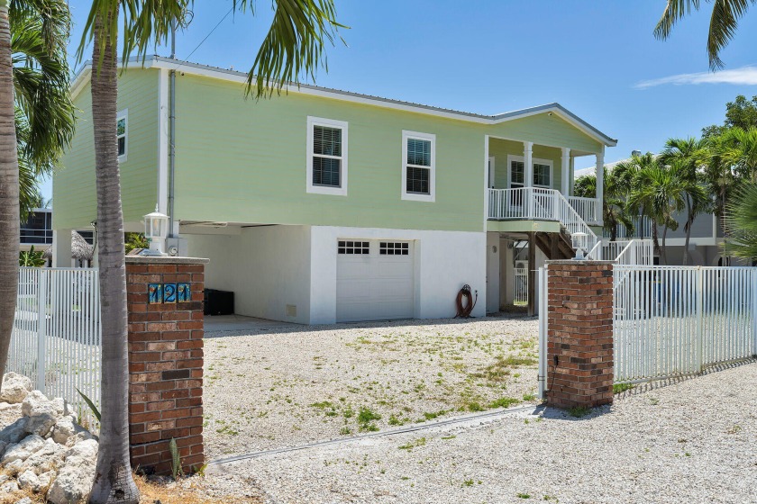 Discover the ultimate waterfront retreat in the heart of - Beach Home for sale in Lower Matecumbe Key, Florida on Beachhouse.com