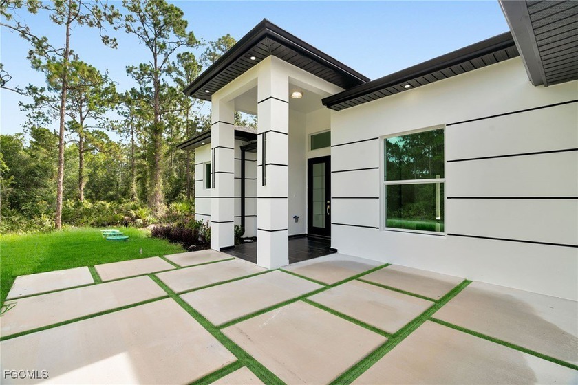 Welcome to your dream home in the heart of Lehigh Acres! This - Beach Home for sale in Lehigh Acres, Florida on Beachhouse.com