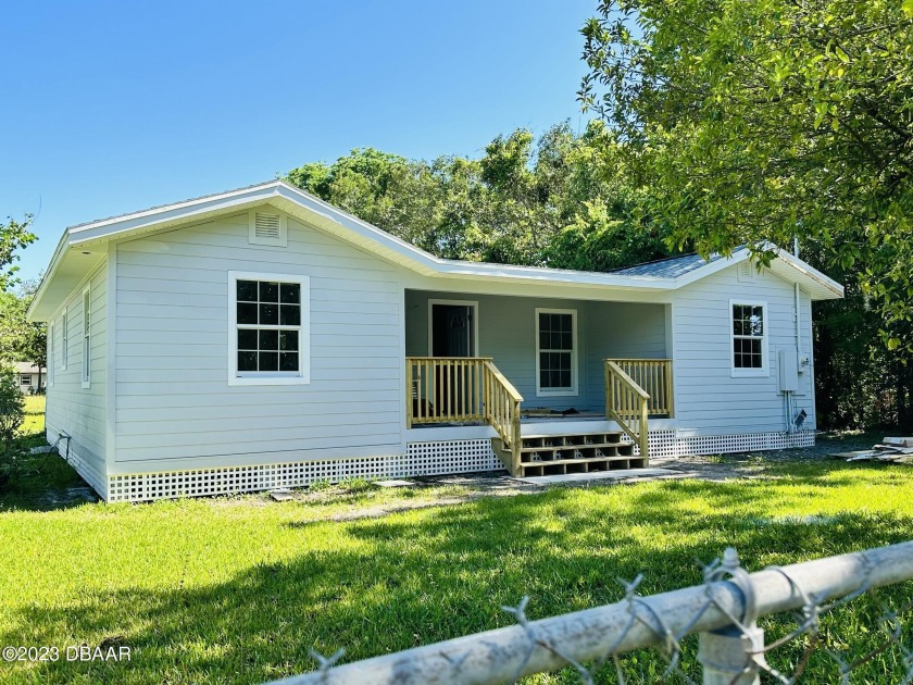 Newly renovated 4 Bedroom 2 Bath home with an additional - Beach Home for sale in Holly Hill, Florida on Beachhouse.com