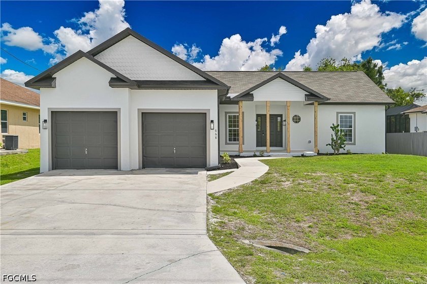 Welcome to this Stunning renovated home In Lehigh Acres. The - Beach Home for sale in Lehigh Acres, Florida on Beachhouse.com