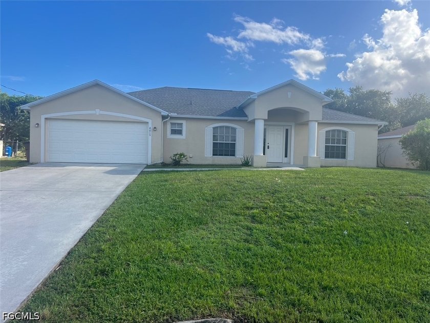 Welcome to a beautifully maintained oversized one story home - Beach Home for sale in Lehigh Acres, Florida on Beachhouse.com