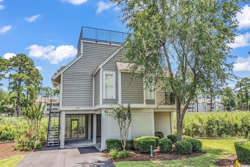 Grab a cocktail, pick your favorite porch and enjoy a Carolina - Beach Home for sale in North Myrtle Beach, South Carolina on Beachhouse.com