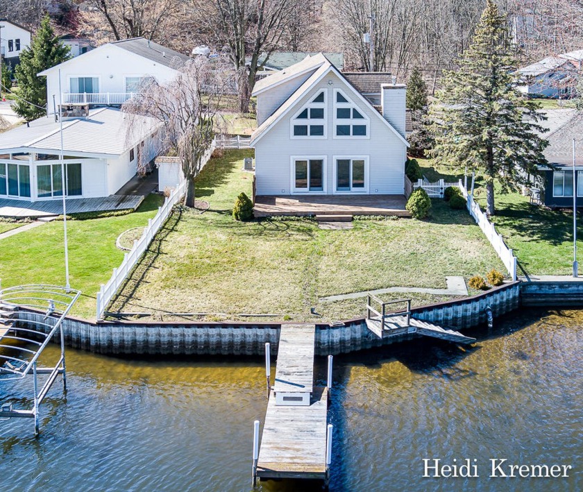 SPRING LAKE WATERFRONT HOME W/PRIVATE DOCK ! IMMEDIATE - Beach Home for sale in Spring Lake, Michigan on Beachhouse.com