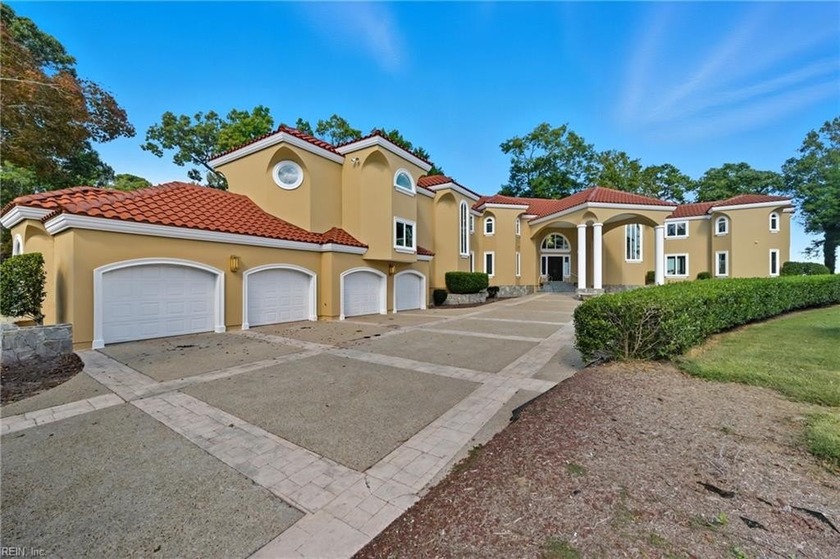 Welcome to this exquisite Spanish-style waterfront estate which - Beach Home for sale in Suffolk, Virginia on Beachhouse.com