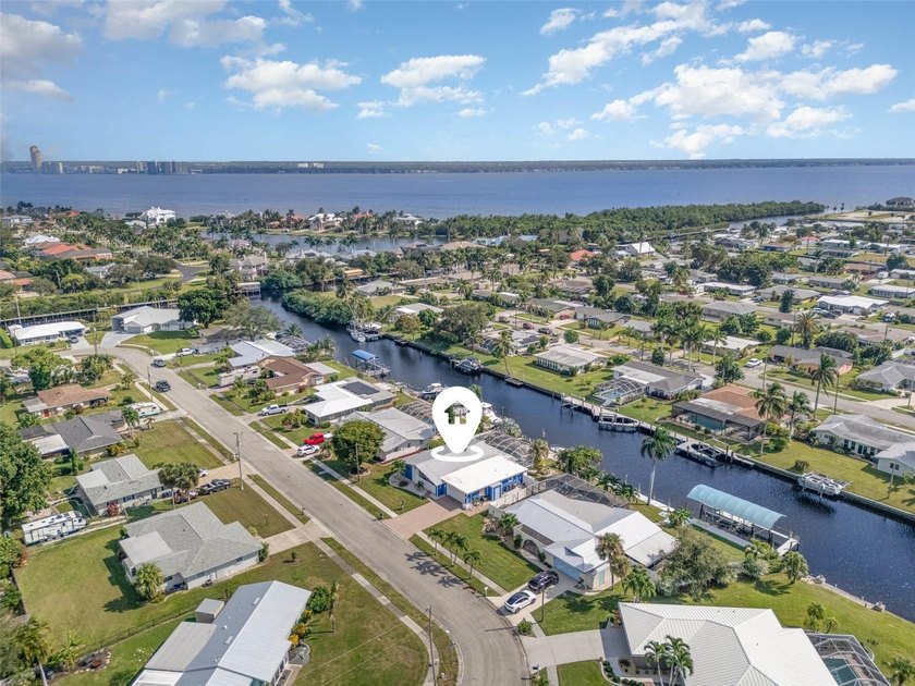 DISCOVER THE WATERFRONT LIFESTYLE YOU'VE BEEN DREAMING OF - Beach Home for sale in North Fort Myers, Florida on Beachhouse.com