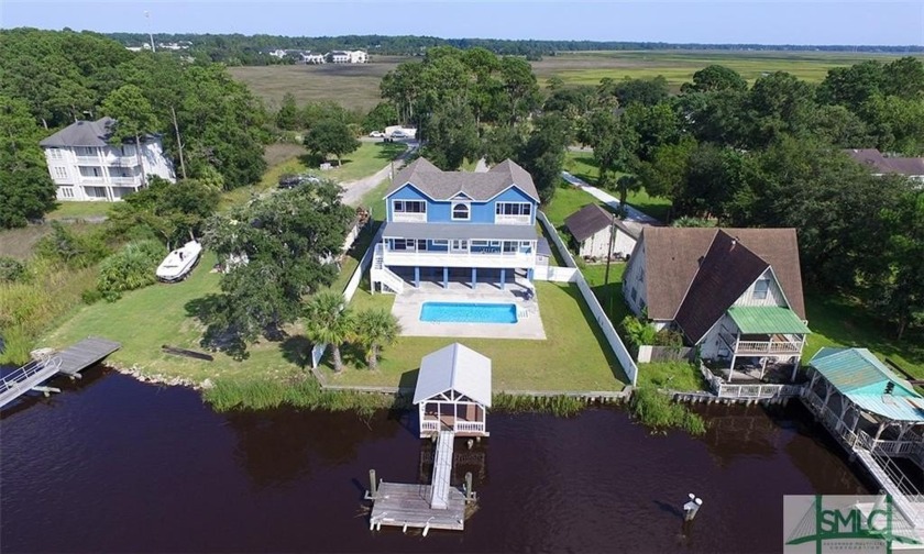 This stunning 2021 custom home on .67 acres w 100 ft on Forest - Beach Home for sale in Savannah, Georgia on Beachhouse.com