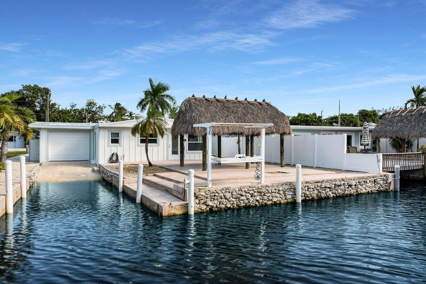 Located on a tranquil canal-front setting in the desirable - Beach Home for sale in Plantation Key, Florida on Beachhouse.com