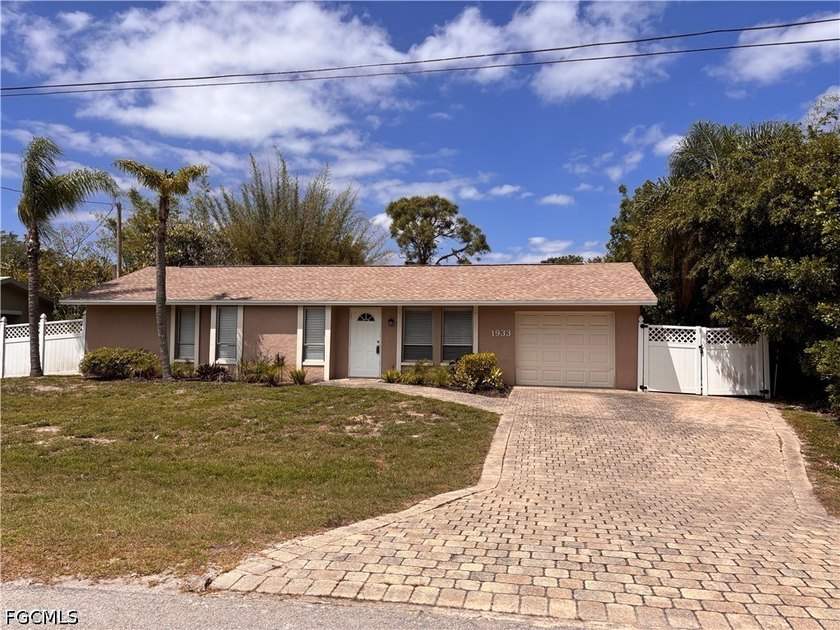 Located on an OVERSIZED GULF ACCESS LOT is this updated, ready - Beach Home for sale in North Fort Myers, Florida on Beachhouse.com