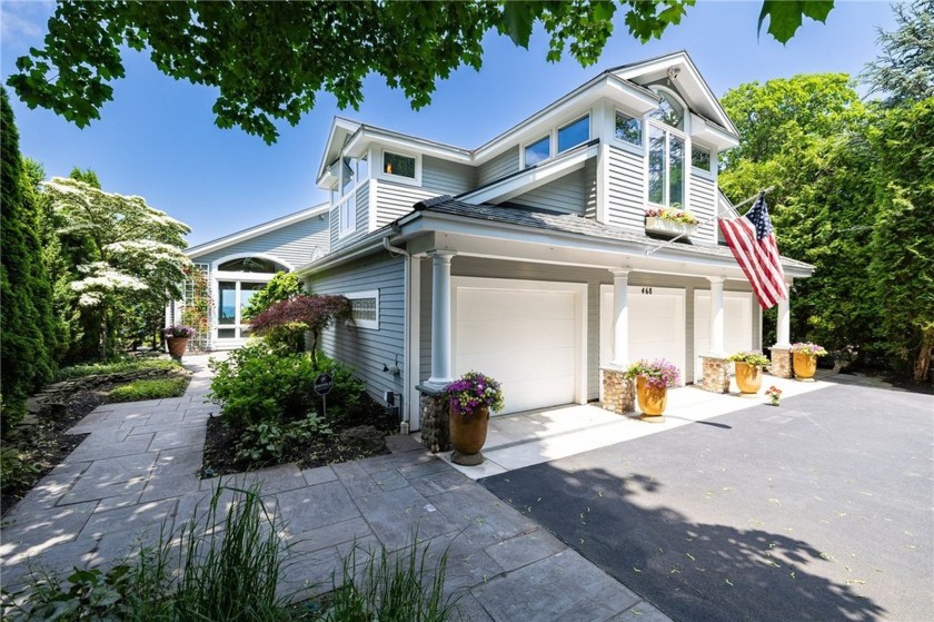 MAGAZINE-WORTHY LAKEFRONT LUXURY This exceptional lake home has - Beach Home for sale in Webster, New York on Beachhouse.com