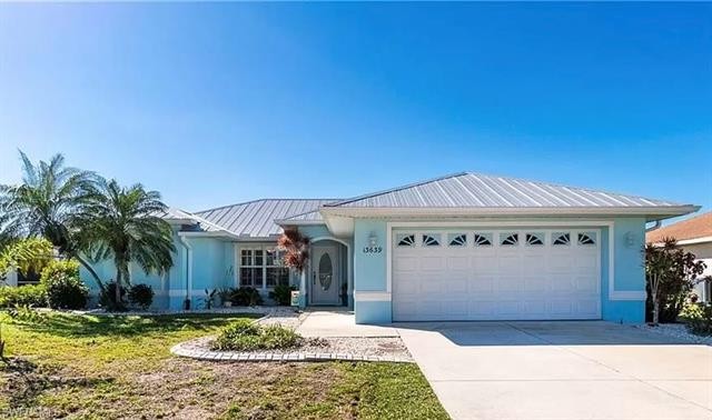 Welcome home to this beautiful canal front home with a private - Beach Home for sale in Port Charlotte, Florida on Beachhouse.com