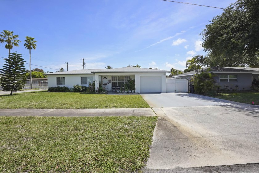 Welcome to this inviting single-story residence in the heart of - Beach Home for sale in Lake Worth Beach, Florida on Beachhouse.com