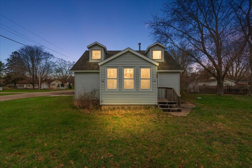 Don't miss this charming 2-bedroom Cape Cod- style residence - Beach Home for sale in Norton Shores, Michigan on Beachhouse.com