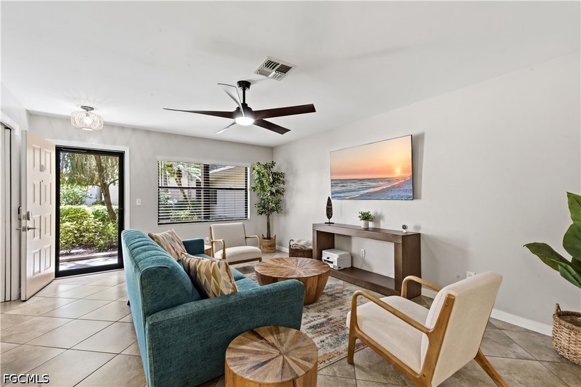 Tucked into lush greenery, this first-floor condo feels more - Beach Condo for sale in Fort Myers, Florida on Beachhouse.com