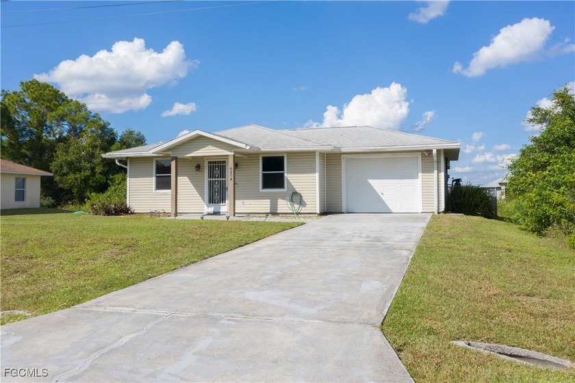 Discover comfort and convenience in this well-maintained home - Beach Home for sale in Lehigh Acres, Florida on Beachhouse.com