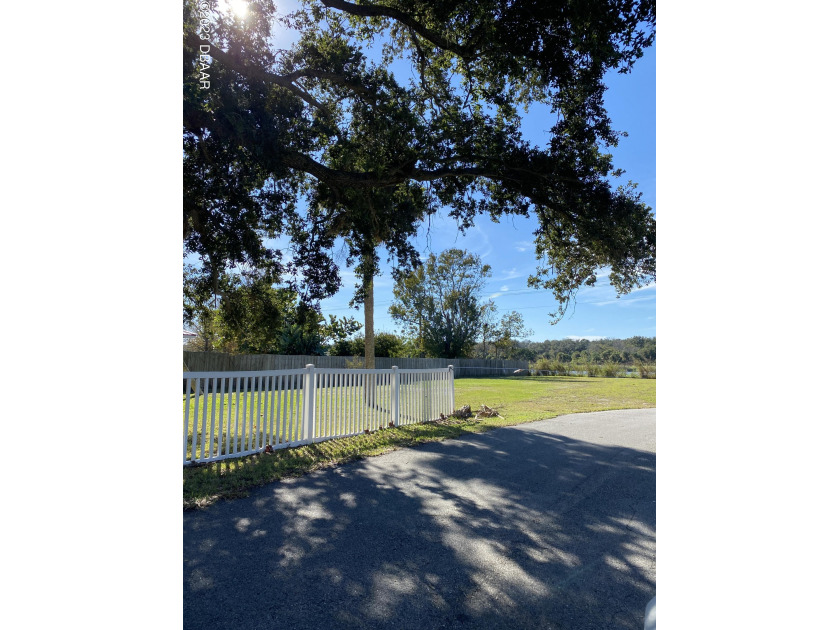 Fantastic cleared vacant lot on a lake and across from an - Beach Lot for sale in Edgewater, Florida on Beachhouse.com