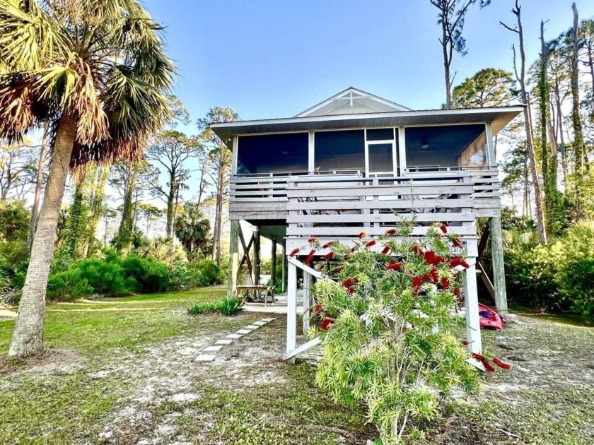 This charming Bay Front property offers 2 bedrooms and 2 - Beach Home for sale in Port St Joe, Florida on Beachhouse.com