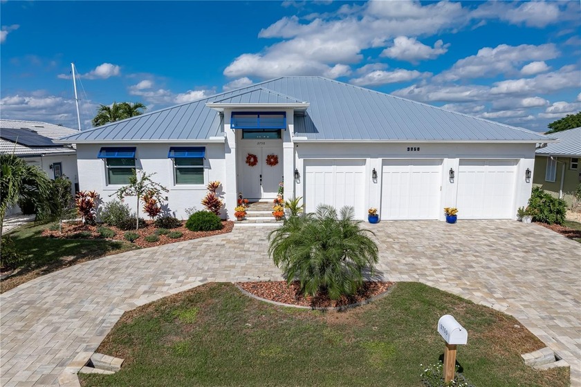 SPECTACULAR WATERFRONT HOME IN PGI W/QUICK SAIL ACCESS - Located - Beach Home for sale in Punta Gorda, Florida on Beachhouse.com