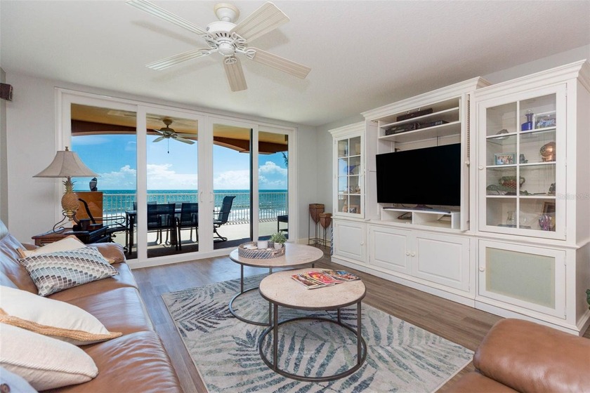 This exceptional residence includes a private one-car garage and - Beach Condo for sale in Redington Beach, Florida on Beachhouse.com