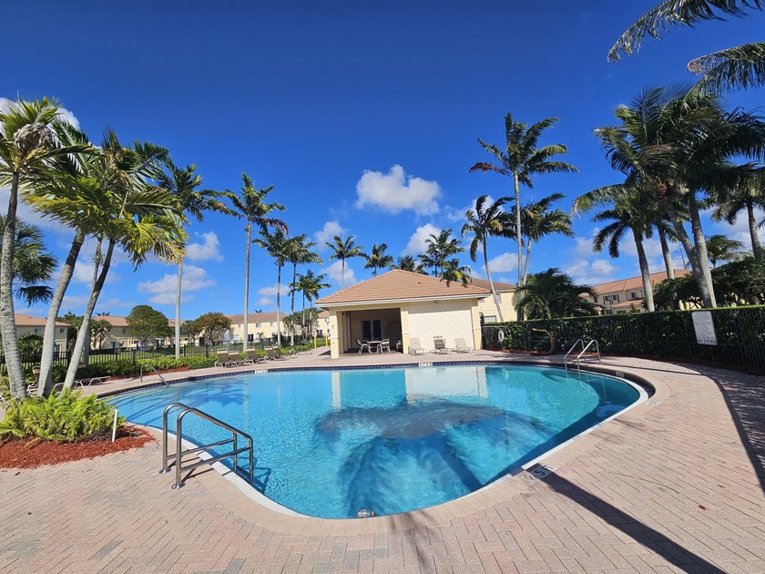 This beautifully maintained 3-bedroom, 2-bathroom villa offers - Beach Home for sale in Lauderdale Lakes, Florida on Beachhouse.com