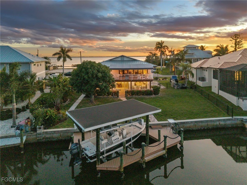 Coastal Chic Island Retreat with Quick Deep-Water Access -- Step - Beach Home for sale in St. James City, Florida on Beachhouse.com