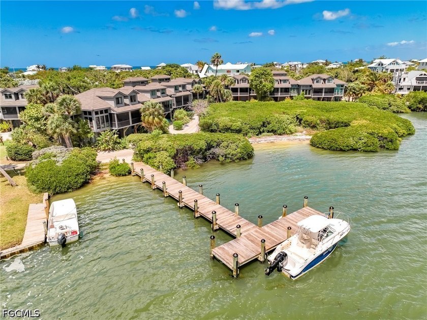 End Unit With Harbor Views & Dock Access! Experience the - Beach Townhome/Townhouse for sale in North Captiva Island, Florida on Beachhouse.com