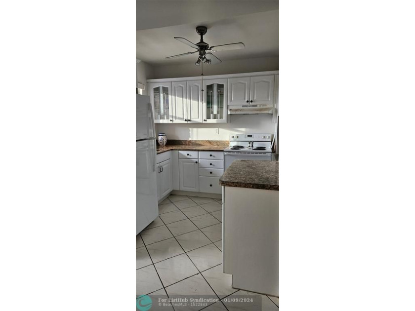 This lovely condo has new flooring in living area and bedroom - Beach Condo for sale in Sunrise, Florida on Beachhouse.com