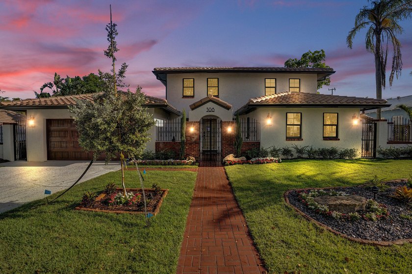 Welcome to this stunning 5-bedroom/ 4.5-bath residence located - Beach Home for sale in West Palm Beach, Florida on Beachhouse.com