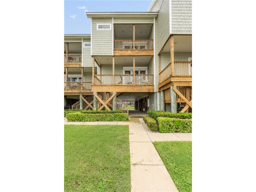 Experience the pinnacle of coastal living in this impeccably - Beach Townhome/Townhouse for sale in Dauphin Island, Alabama on Beachhouse.com