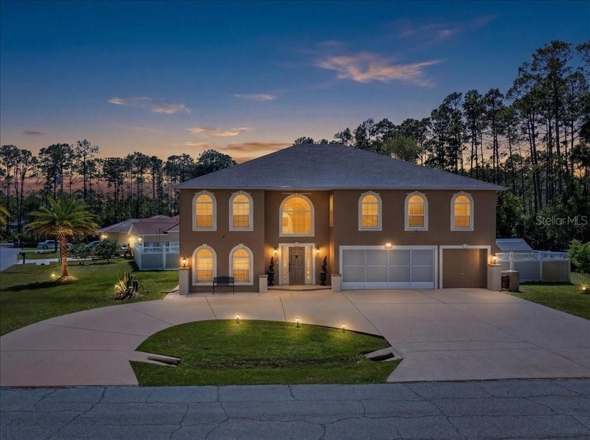 Stunning 2-Story Home with Luxurious Features, Pool, and - Beach Home for sale in Palm Coast, Florida on Beachhouse.com