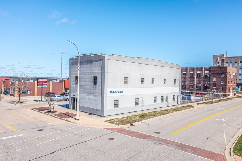 Prime location in the heart of Downtown Muskegon! Formerly home - Beach Commercial for sale in Muskegon, Michigan on Beachhouse.com