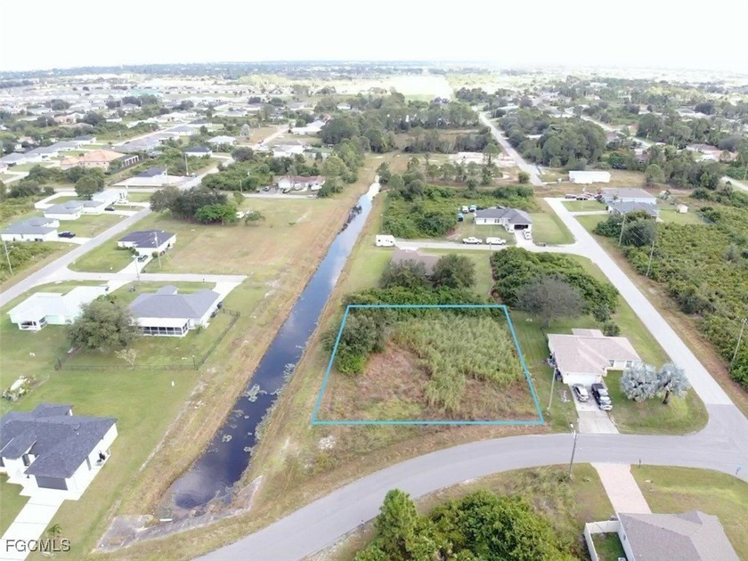 Beautiful 1/2 ACRE lot along a canal in the sought-after area - Beach Lot for sale in Lehigh Acres, Florida on Beachhouse.com
