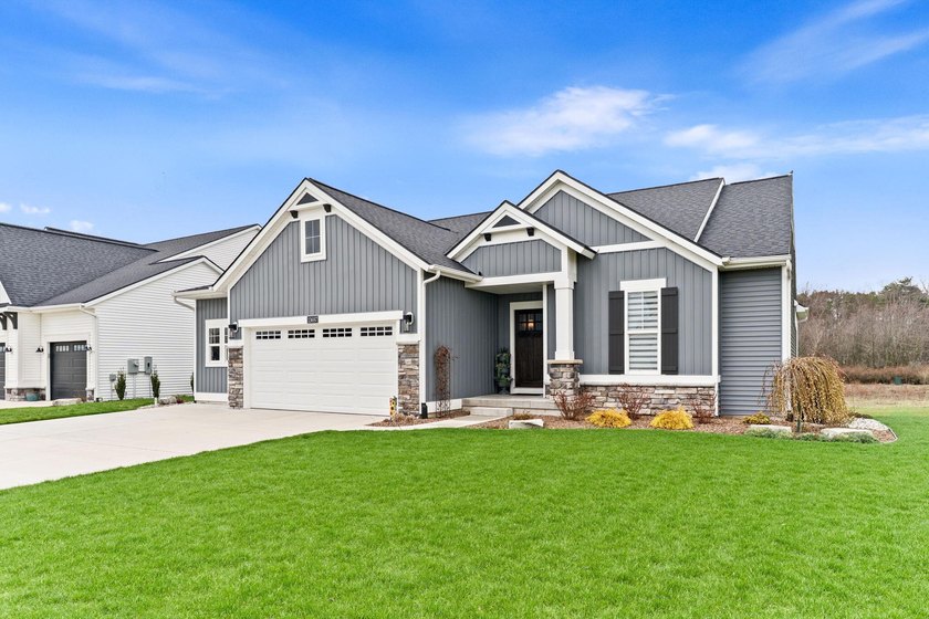 Welcome to this charming home located in Holland's most - Beach Home for sale in Holland, Michigan on Beachhouse.com