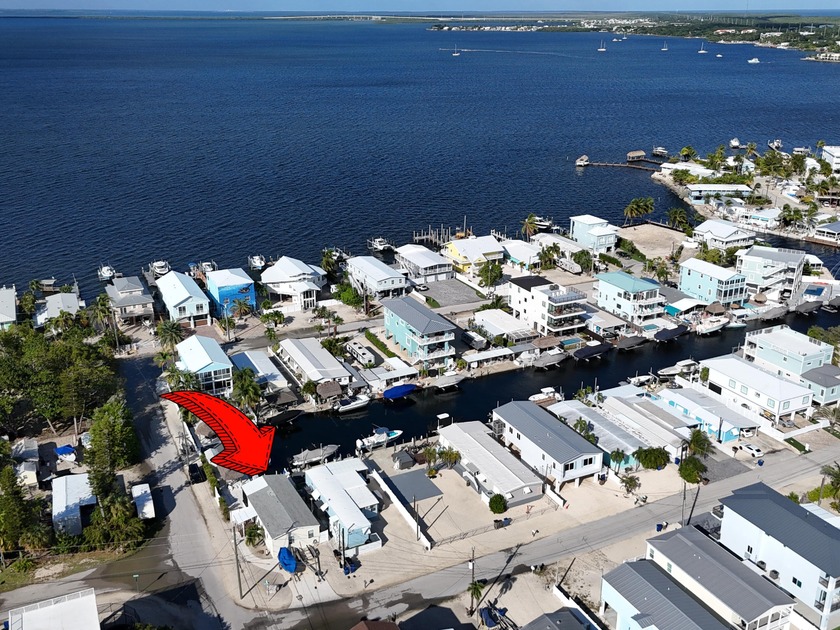 Discover this beautifully maintained 2-bedroom, 2-bathroom canal - Beach Home for sale in Key Largo, Florida on Beachhouse.com