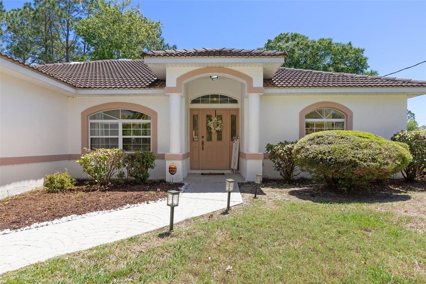 Stop the scroll: Welcome home to this charming 3-bedroom, 2-bath - Beach Home for sale in Palm Coast, Florida on Beachhouse.com