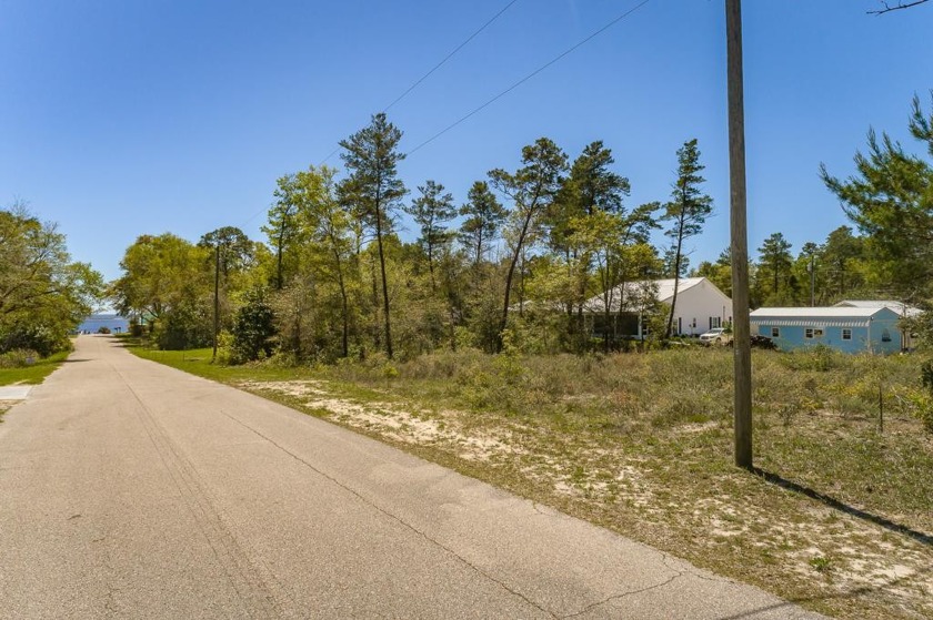 A beautiful interior lot located in Lanark with some water view! - Beach Lot for sale in Lanark Village, Florida on Beachhouse.com