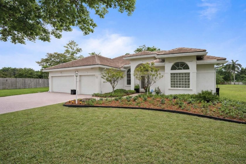 Rare opportunity in gated Estates of Stirling Lake. One of the - Beach Home for sale in Davie, Florida on Beachhouse.com