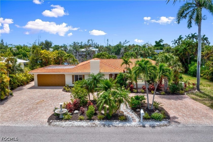 Fabulous TURNKEY executive home in the much sought after Gumbo - Beach Home for sale in Sanibel, Florida on Beachhouse.com