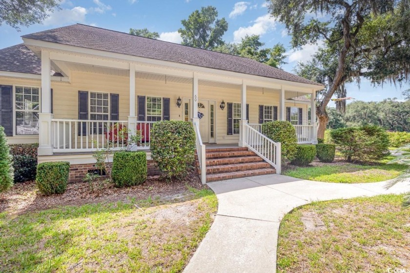 Welcome to 60 Wraggs Ferry Road, nestled within the prestigious - Beach Home for sale in Georgetown, South Carolina on Beachhouse.com