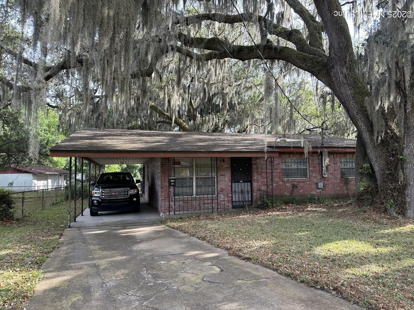 This 4-bedroom, 2-bath brick home is an investor's gem or a - Beach Home for sale in Jacksonville, Florida on Beachhouse.com