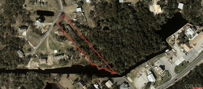Canal Frontage, large lot, opportunity to build while you have a - Beach Home for sale in Frisco, North Carolina on Beachhouse.com
