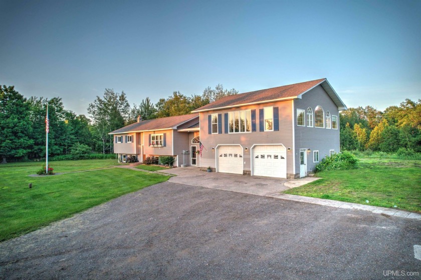 Welcome to this Stanton Township 5-bed, 1.5-bath oasis nestled - Beach Home for sale in Atlantic Mine, Michigan on Beachhouse.com