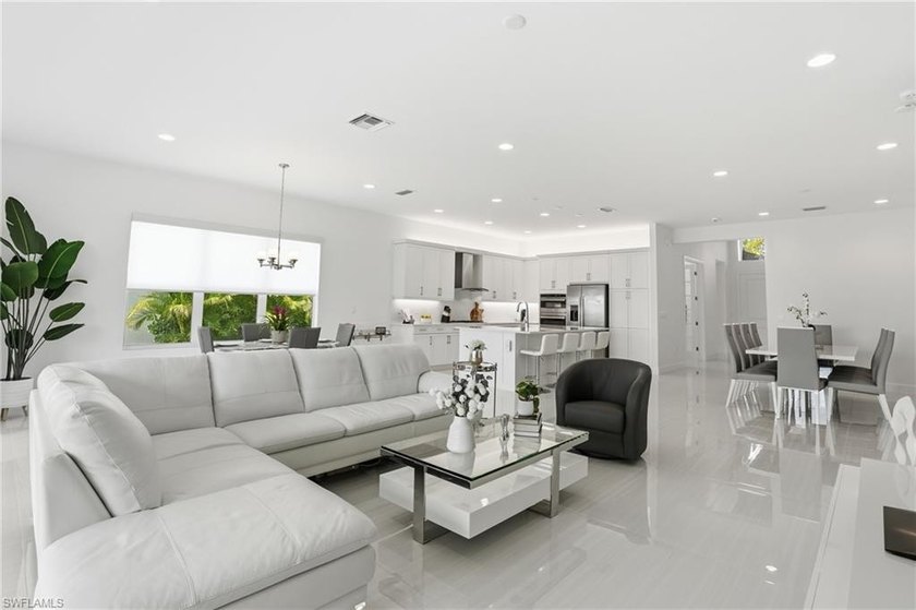 This stunning Pearl model home with extended square footage - Beach Home for sale in Naples, Florida on Beachhouse.com