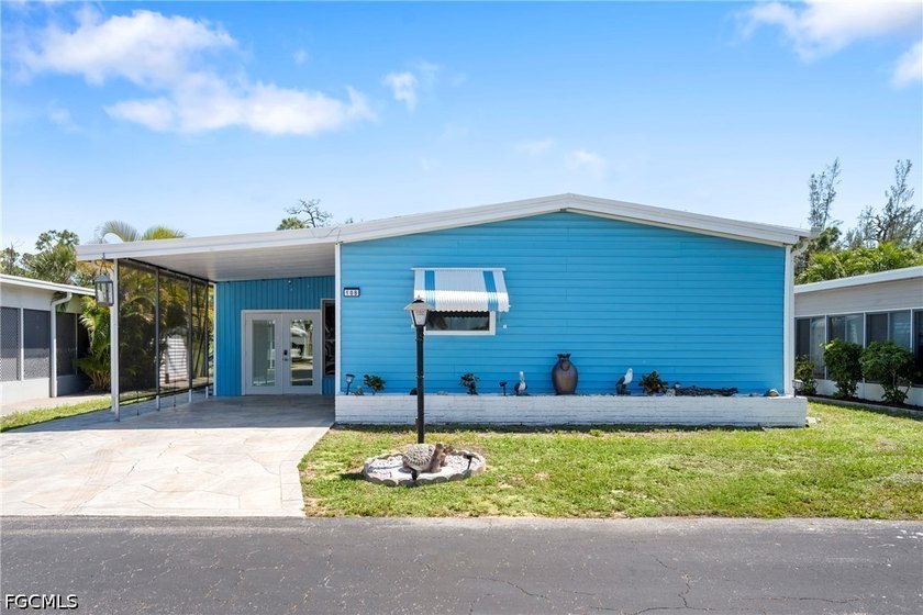 Nestled in Coachlight Manor, a 55+ river-access community in - Beach Home for sale in Fort Myers, Florida on Beachhouse.com